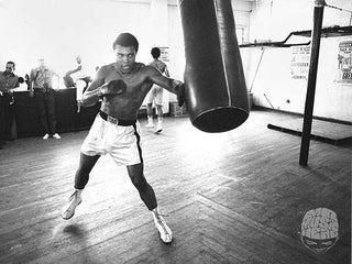 Ali, On Heavy Bag, 1971, by Chris Smith