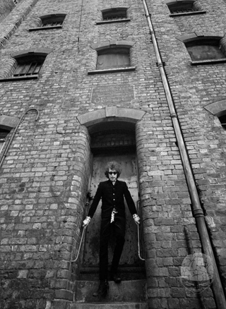 Bob Dylan in Doorway, Liverpool, England. 1966, by Barry Feinstein