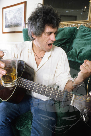 Keith Richards on Couch, Pt. ll, Rome, 1983 by Luciano Viti