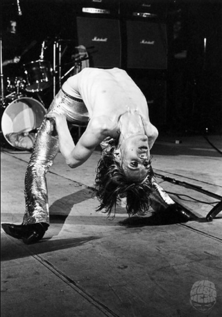 Iggy Pop, Backbend, 1972 by Mick Rock