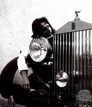 Alice Cooper with Rolls Royce, by James Fortune